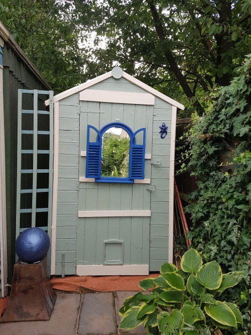 Transformed shed with mirror