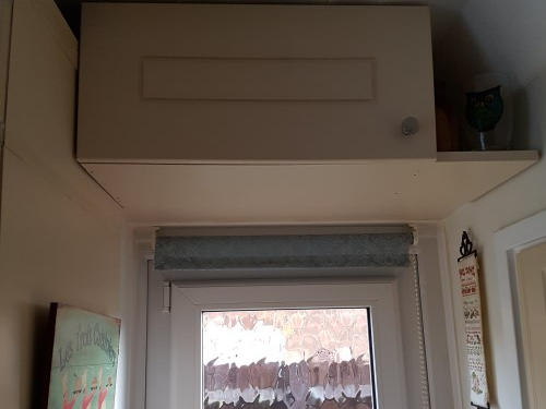 Kitchen wall cupboard storage