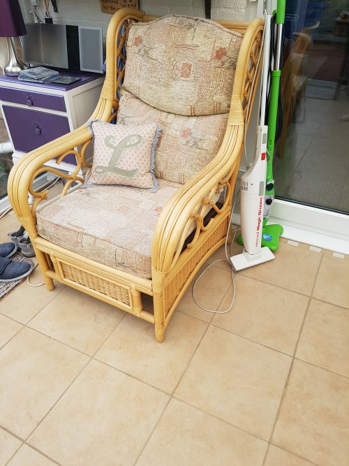 Tired and faded conservatory chair