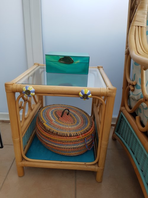 Panels repainted;  shelf covered in fabric and decoration added