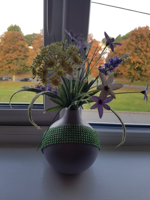 Vase with bling and flowers