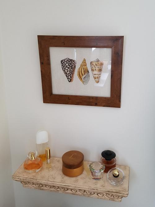 Decorative shelf and seashell embroidery