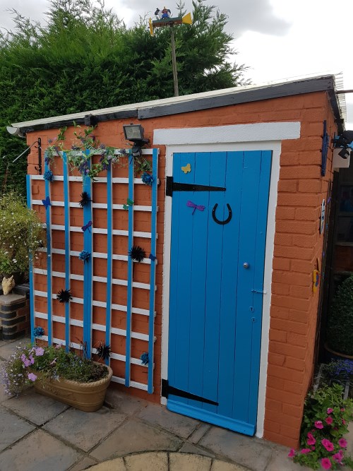 Renovated shed with new trellis