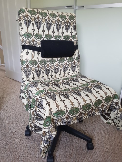 Re-upholstered castor chair